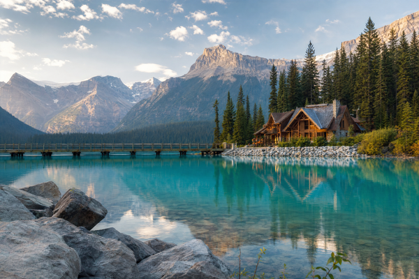 Sunrise over Banff's mountains with a clear view of the town below