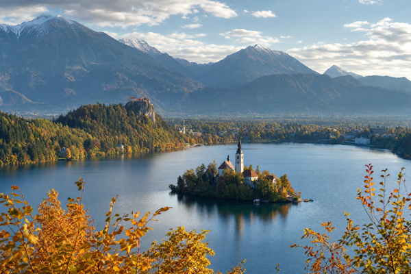 Lake Bled in Slovenia with the island and mountains in the background under a clear sky