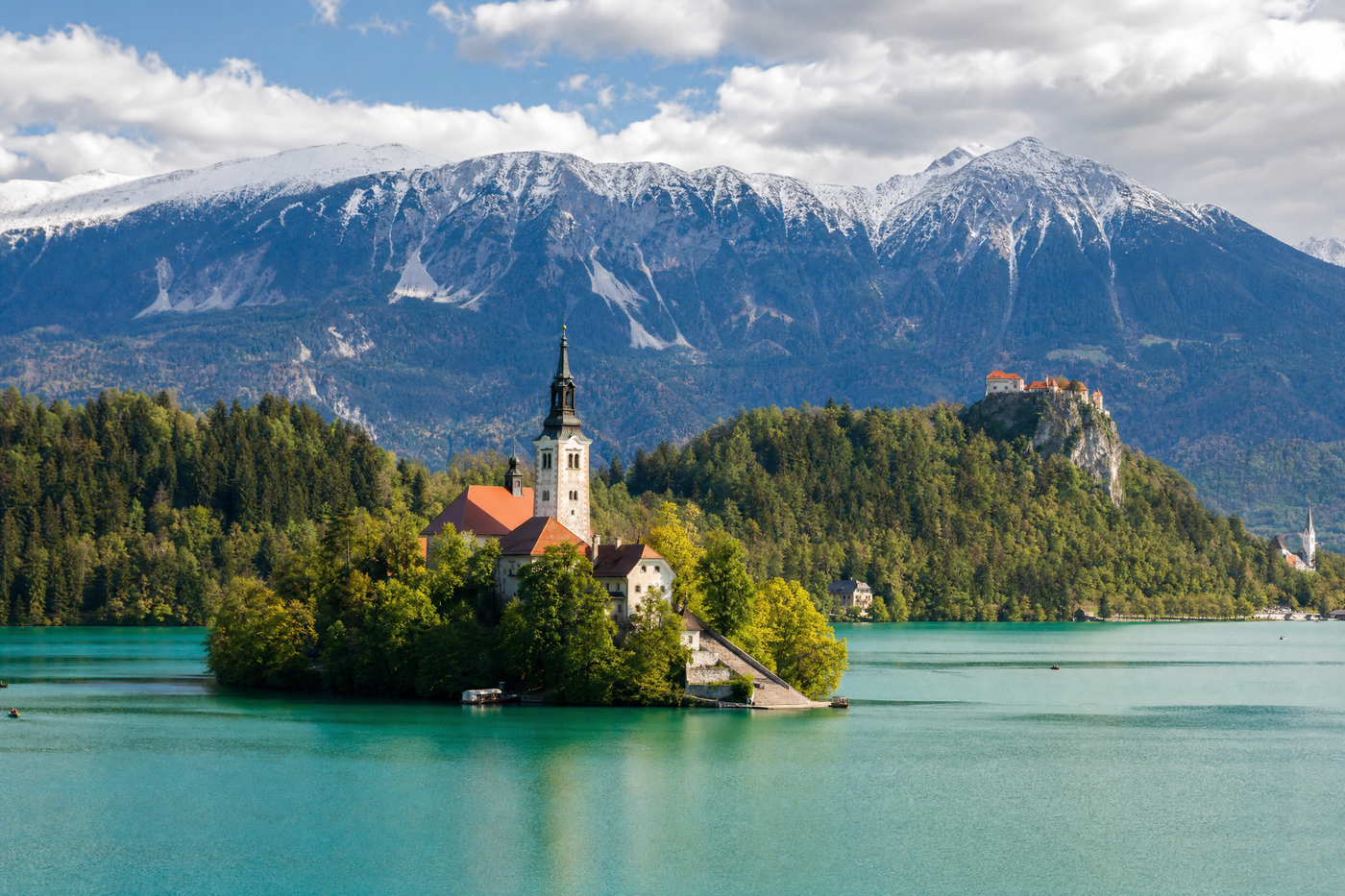 Scenic Lake Bled with island and castle surrounded by mountains