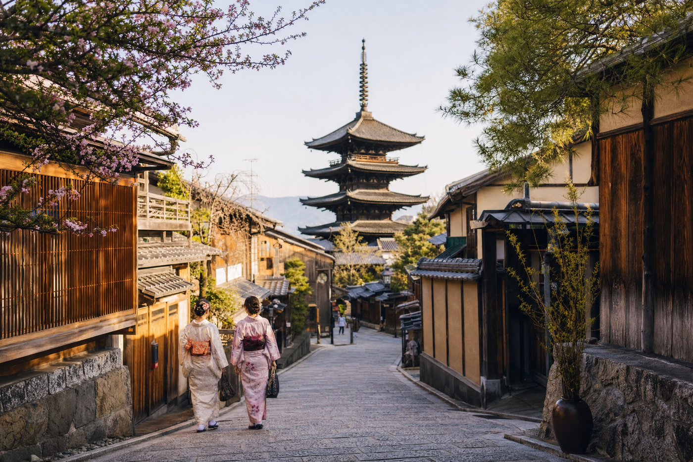View of Kyoto with historic temples and cityscape under clear sky
