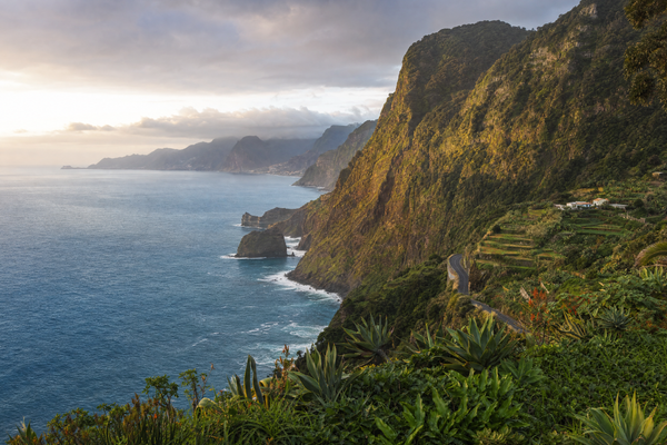 Panoramic view of Madeira island coastline with ocean and mountains