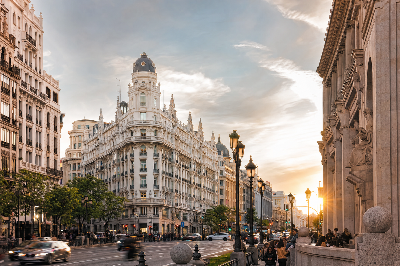 Evening in Plaza Mayor Madrid with people dining outdoors.