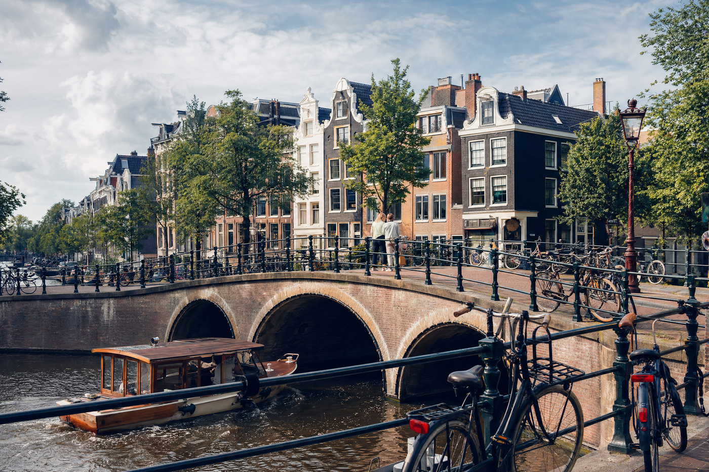 Amsterdam canals, historic houses, and lively neighborhoods in the city center.