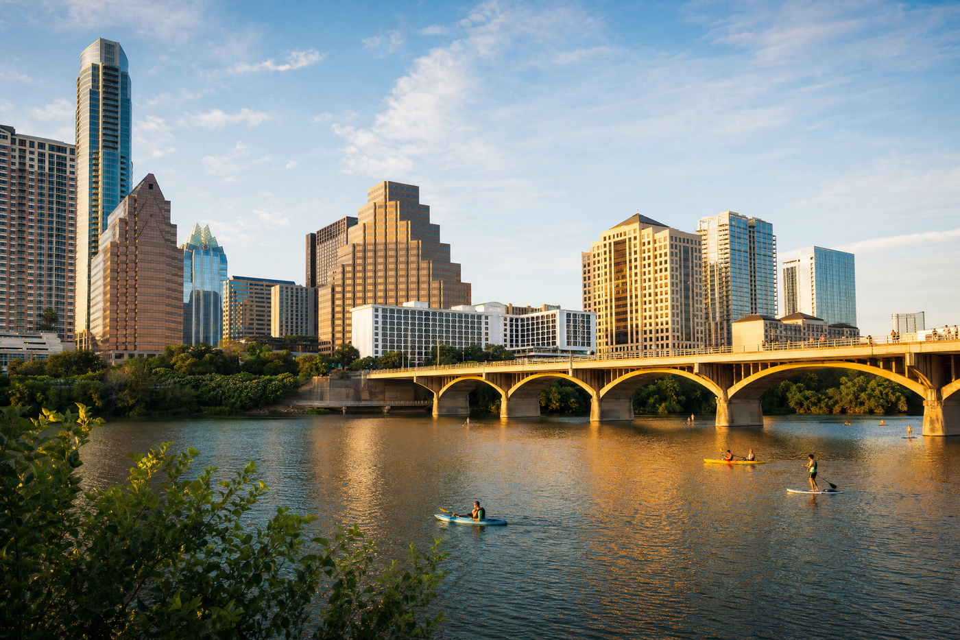 View of downtown Austin skyline, Lady Bird Lake, and nearby hotel neighborhoods