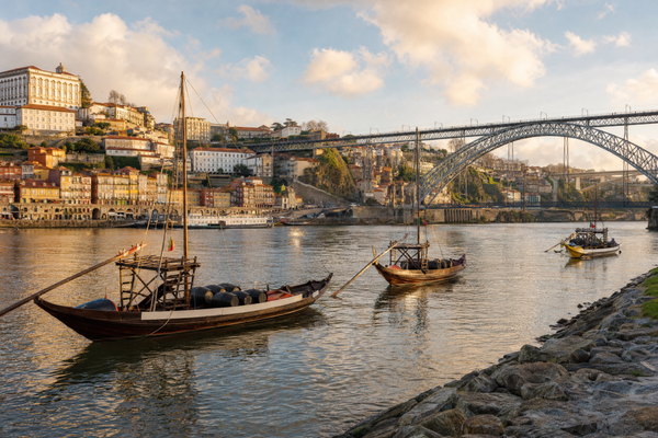 View over Porto's colorful riverside neighborhoods at sunset.