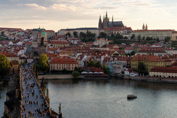 Prague city view with Old Town rooftops and Charles Bridge