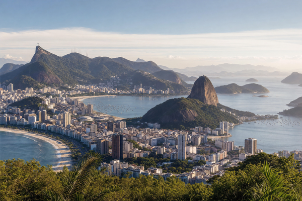Aerial view of Rio de Janeiro's Copacabana neighborhood with Sugarloaf Mountain in the background